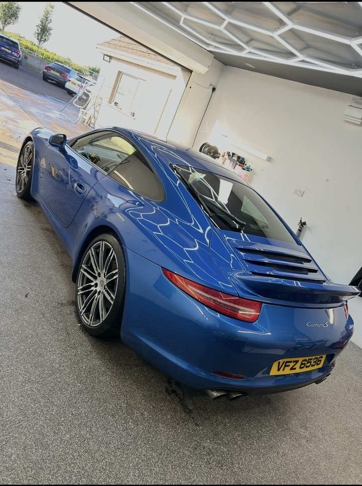 Blue Porsche after detailing work